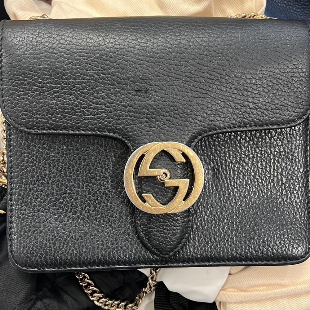 Black gucci leather bag used.